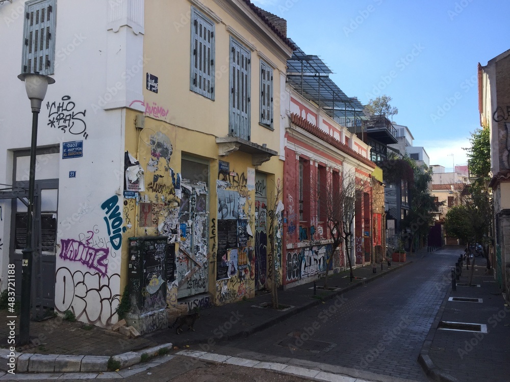 Fototapeta premium Street art in Athens Greece, grafiti, colorful paintings and drawings on the walls for tourists to see