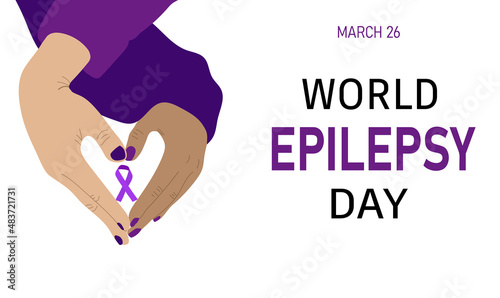 World Epilepsy Day.  Hands making heart shape holding awareness ribbon
