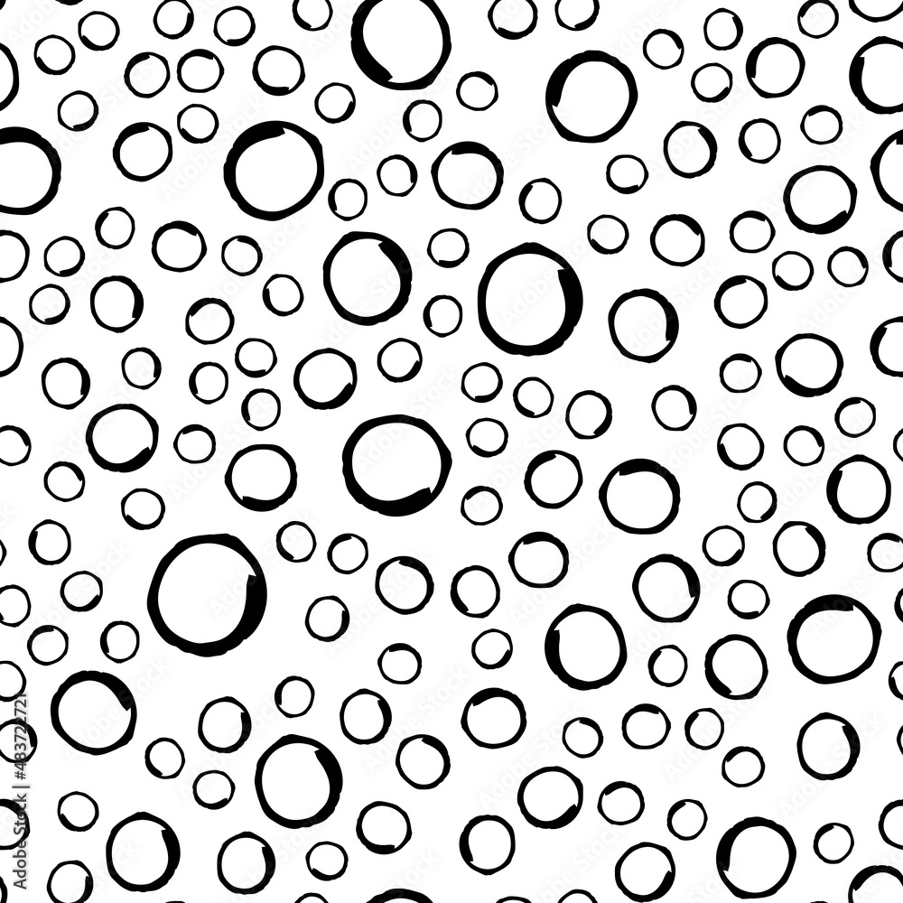 Vector illustration of seamless black dot pattern with different grunge effect rounded spots