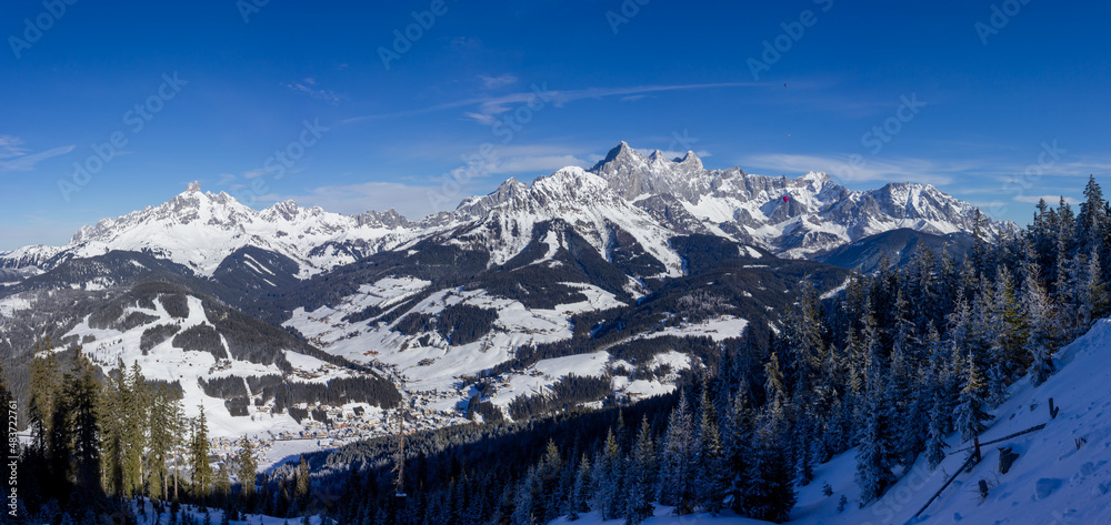 Wide panorama of Filzmoos and the surrounding countryside during wintertime (View from Rossbrand mountain)