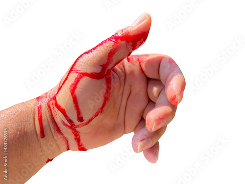 Real red blood on hand on white background with copy 
 space. Accident form a knife cut finger.