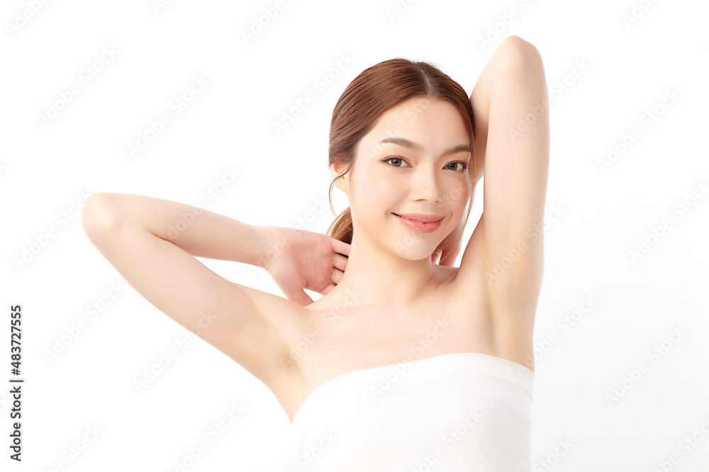 Beautiful Young Asian woman lifting hands up to show off clean and hygienic armpits or underarms on white background, Smooth armpit cleanliness and protection concept Beautiful Young Asian woman lifting hands up to show off clean and hygienic armpits or underarms on white background, Smooth armpit cleanliness and protection concept