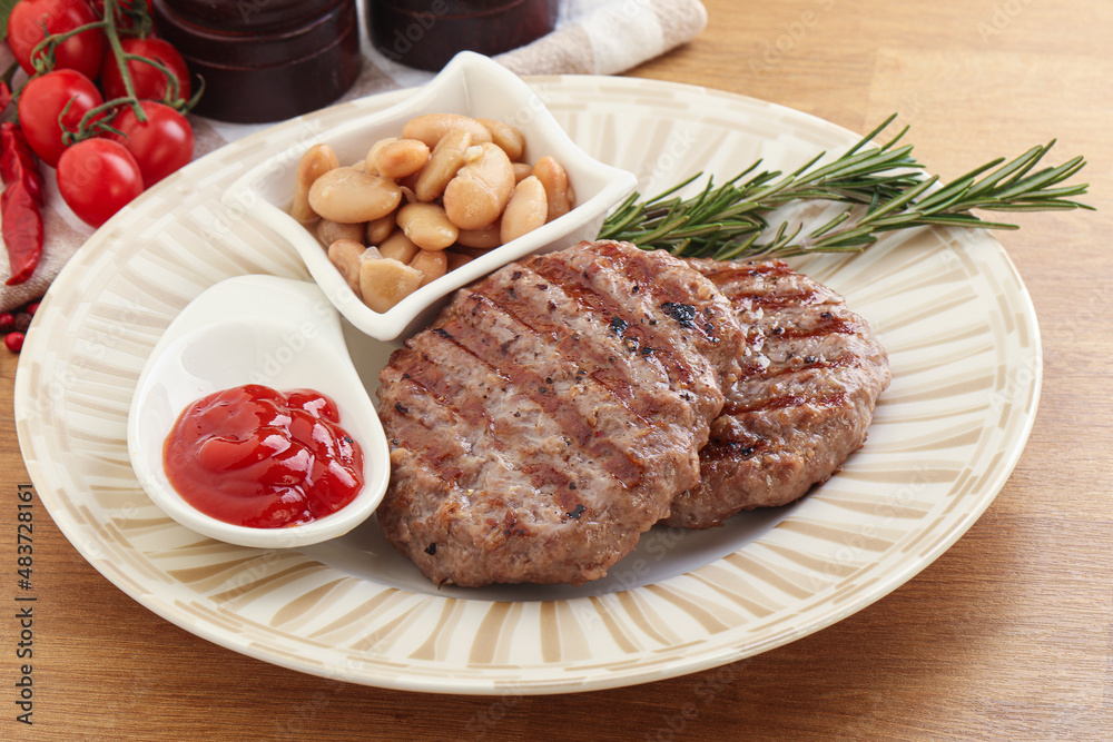 Grilled beef burger cutlet with sauce Grilled beef burger cutlet with sauce