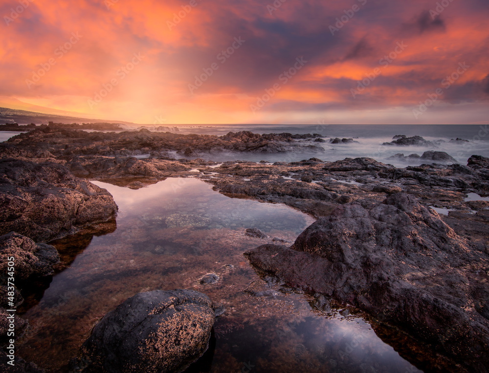 Long exposure seascape. Punta del Hidalgo coastline at sunset. Tenerife. Canary islands Long exposure seascape. Punta del Hidalgo coastline at sunset. Tenerife. Canary islands