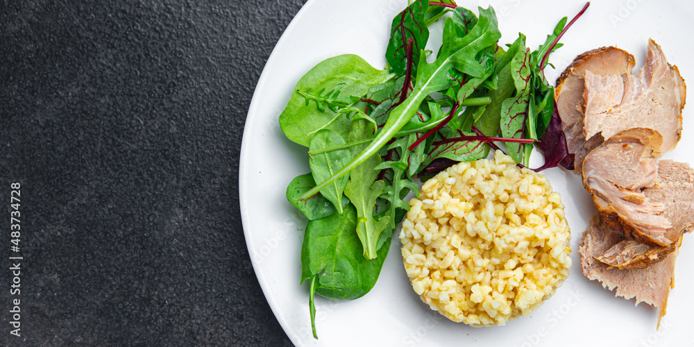 bulgur with meat and leaves lettuce mix fresh portion dietary healthy meal food diet still life snack on the table copy space food background rustic top view keto or paleo diet bulgur with meat and leaves lettuce mix fresh portion dietary healthy meal food diet still life snack on the table copy space food background rustic top view keto or paleo diet