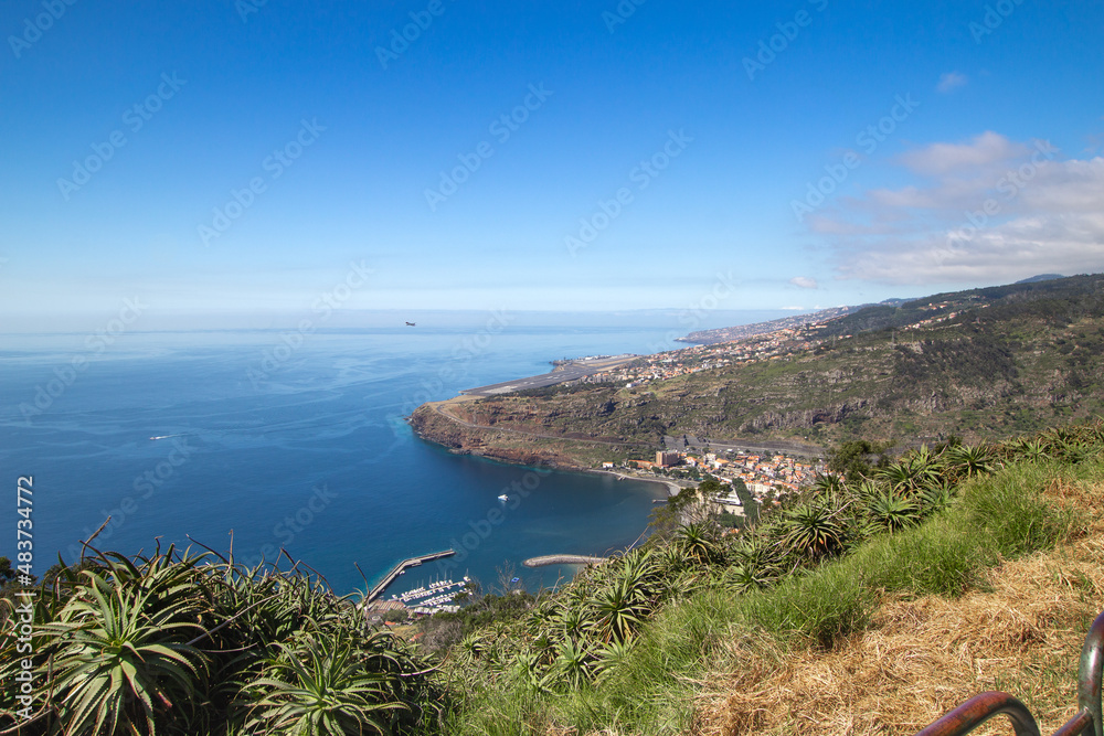 Panoramic view. from Pico do Facho viewpoint. South of Madeira Island with Caniçal town in the background. Madeira. Portugal