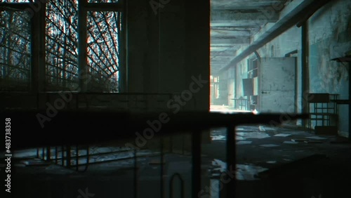 post-apocalypse scenery and horror navigating a structure. photo