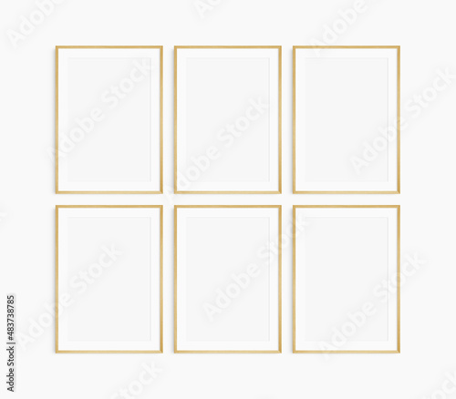 Frame mockup 5x7, 50x70, A4, A3, A2, A1. Set of six thin oak wood frames. Gallery wall mockup, set of 6 frames. Clean, modern, minimalist, bright. Portrait. Vertical. Mat opening 2:3.