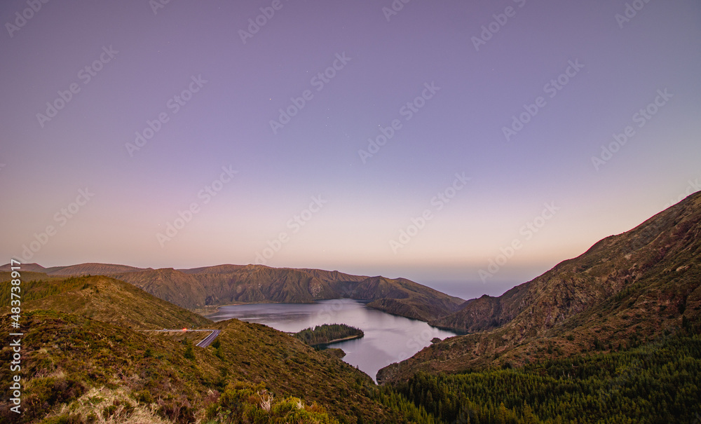 Landscape with mountains and a lagoon, volcanic island, Azores hiking.