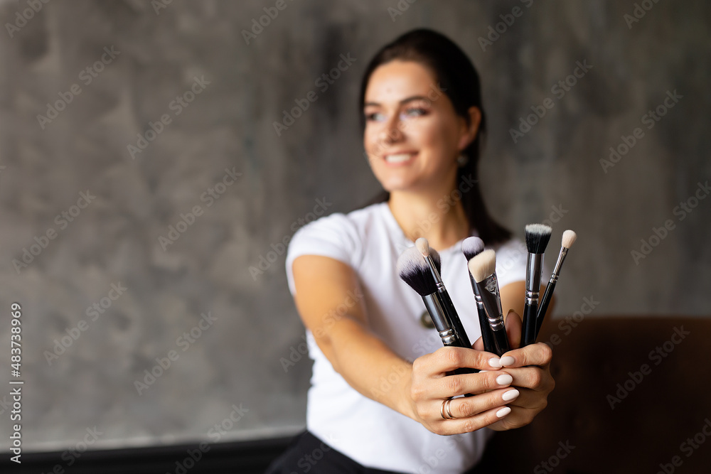 person with a brushes, woman with a brushes, hands with brushes, person with a brushes, woman with a brushes, hands with brushes,