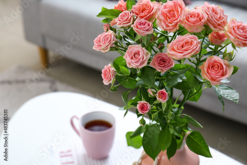 Vase with bouquet of beauti...