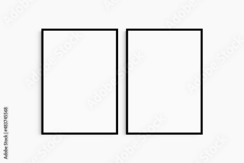 Frame mockup 5x7, 50x70, A4, A3, A2, A1. Set of two thin black frames. Gallery wall mockup, set of 2 frames. Clean, modern, minimalist, bright. Portrait. Vertical.