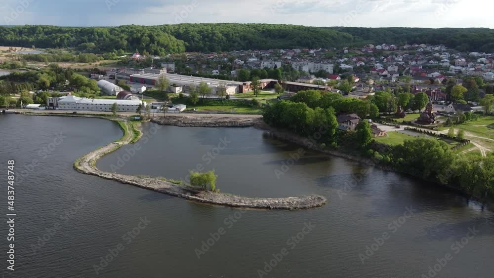 Aerial drone shot of beautiful natural outdoor landscape overlooking blue lake and forest near Yavoriv and Lviv West Ukraine in Eastern Europe on warm sunny summer day. Aerial drone shot of beautiful natural outdoor landscape overlooking blue lake and forest near Yavoriv and Lviv West Ukraine in Eastern Europe on warm sunny summer day.