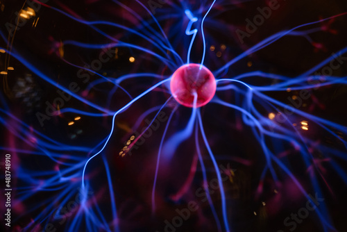 Abstract neuron background. Flashes of purple pink light on a dark background
