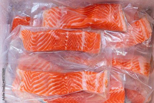 Fresh salmon fillet in vacuum package for delicious salmon menu.