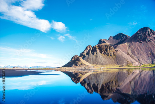 beautiful landscape with most breathtaking mountains Vestrahorn on the Stokksnes peninsula in the mirror of the lake. Exotic countries. Amazing places. (Meditation, antistress - concept).