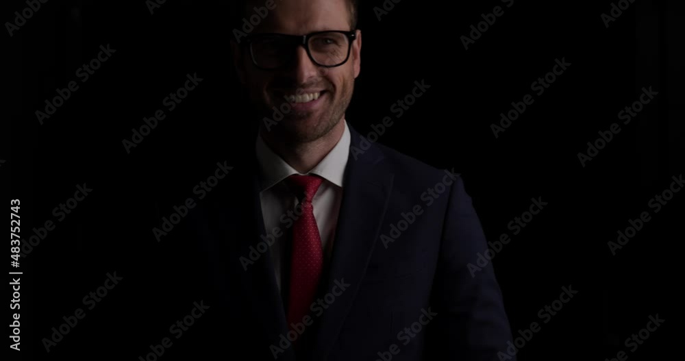 young mysterious businessman walking with a smile, looking around, wearing eyeglasses then leaving young mysterious businessman walking with a smile, looking around, wearing eyeglasses then leaving