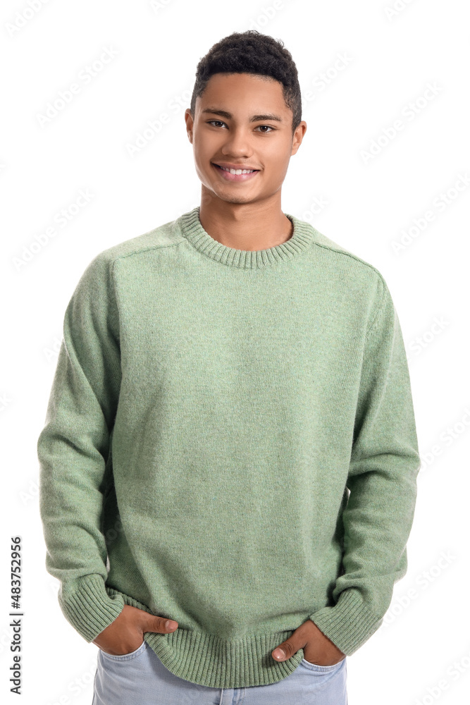 Handsome African-American guy in knitted sweater on white background Handsome African-American guy in knitted sweater on white background