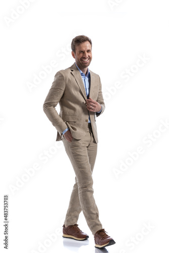 sexy businessman laughing and feeling good, walking © Viorel Sima