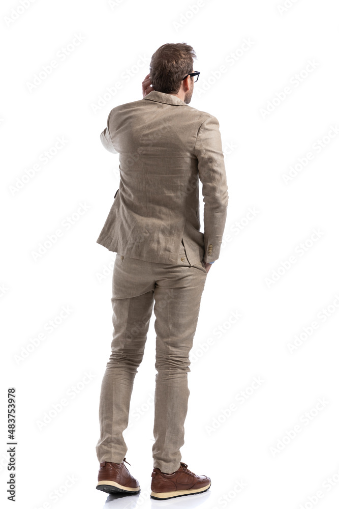 Fototapeta premium businessman scratching his head, thinking of the best strategy
