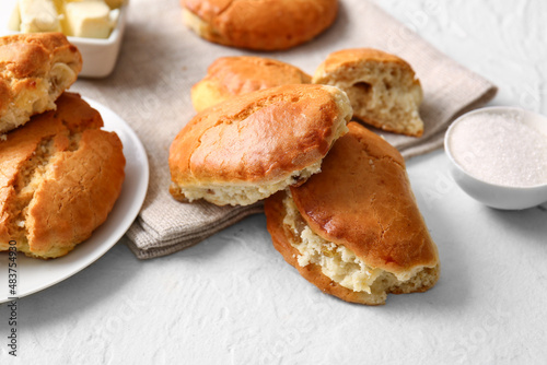 Tasty sochniki with cottage cheese on white background