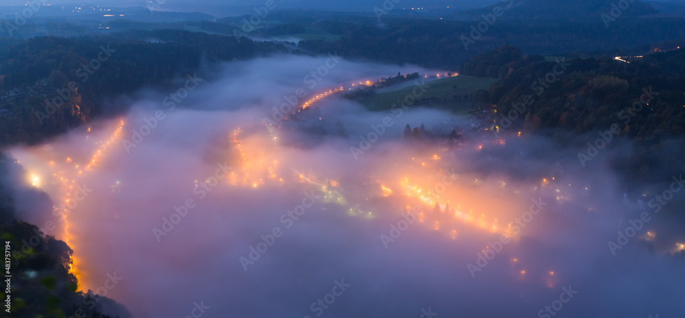 german city of Pirna in the Saxon Alps in the early morning in the fog