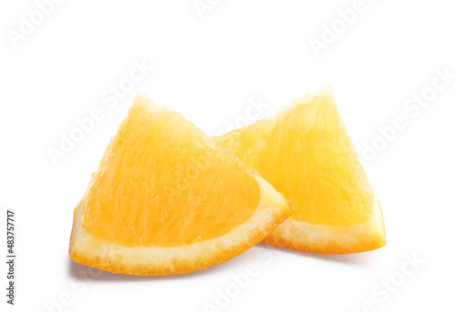 Pieces of fresh juicy orange isolated on white background