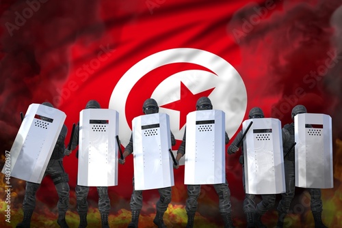 Tunisia protest fighting concept, police officers protecting state against disorder - military 3D Illustration on flag background