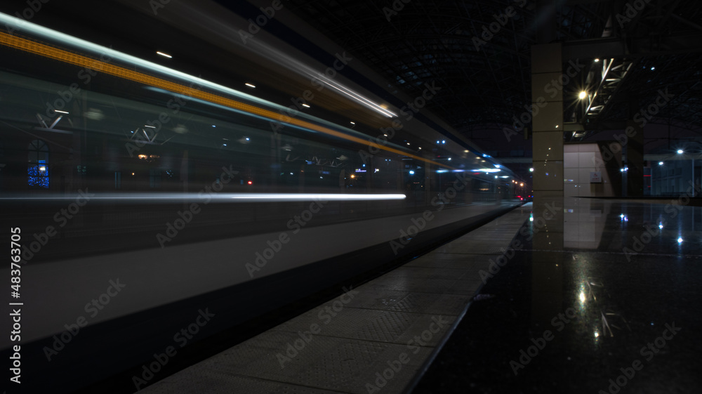 light lines of the train at the night station