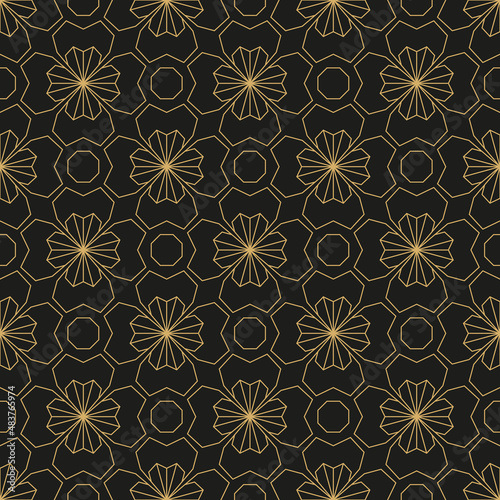 Geometric golden ornament. Seamless pattern on black background.