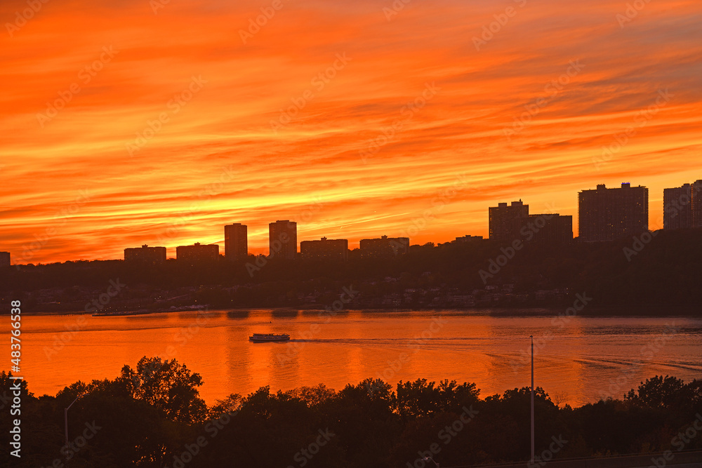 Colorful sunset on Hudson River. New York City, United States
