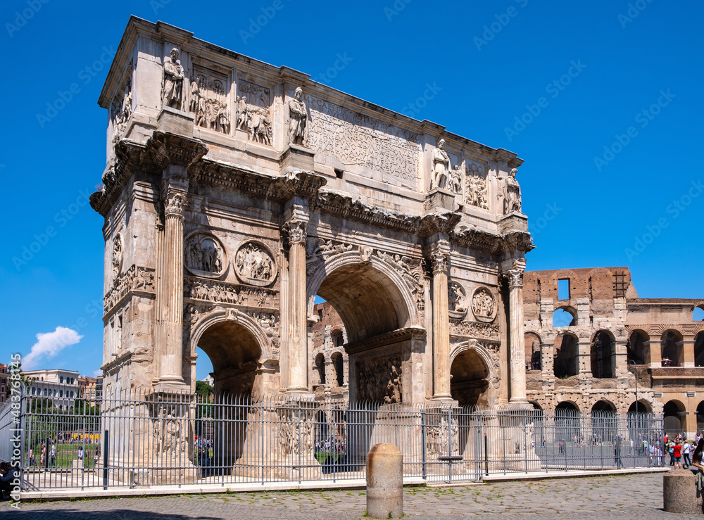 Arch of Constantine the Great emperor Arco di Costantino between Colosseum and Palatine Hill at Via Triumphalis route in historic city center of Rome in Italy