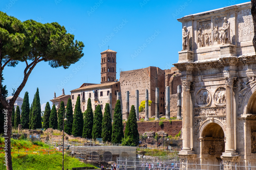 Arch of Constantine the Great emperor Arco di Costantino at Palatine Hill with Santa Francesca Romana Olivetans monastery in historic city center of Rome in Italy