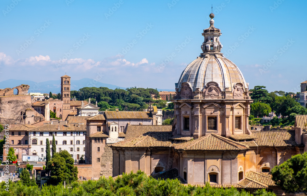 Panorama of Roman Forum Romanum with Santi Luca and Martina martyrs church in historic center of ancient Rome in Italy