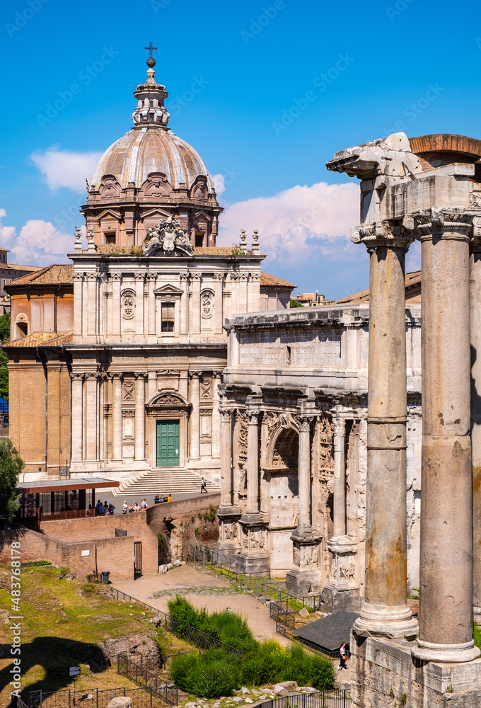 Santi Luca and Martina church with temple of Saturn and Septimius Severus Arch at Roman Forum Romanum in historic center of Rome in Italy