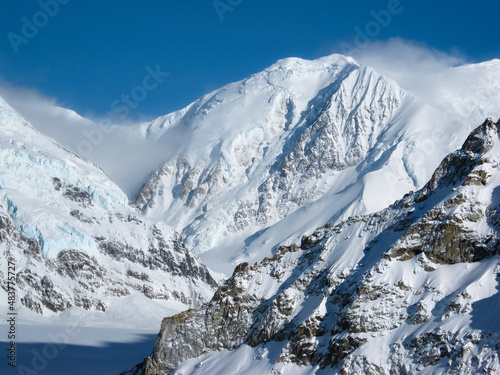 Rugged Mountain Landscape in the Alaska Range in Bright Conditions with Blue Sky