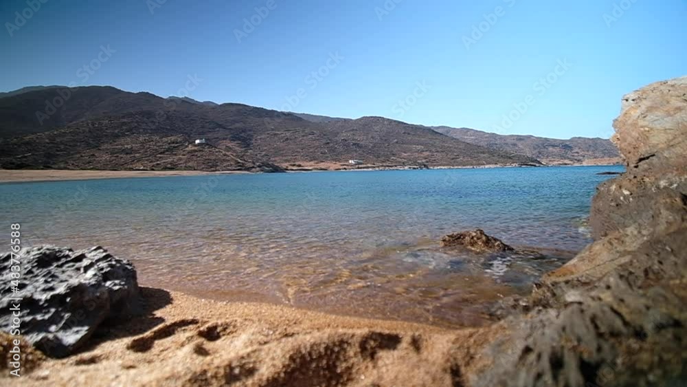 The dream beach of Kalamos in Ios Greece with its unique clear waters in slow motion The dream beach of Kalamos in Ios Greece with its unique clear waters in slow motion