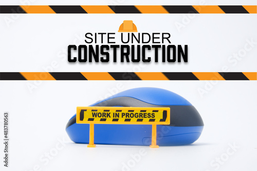 A picture web and page site under construction concept with work in progress sign and mouse.