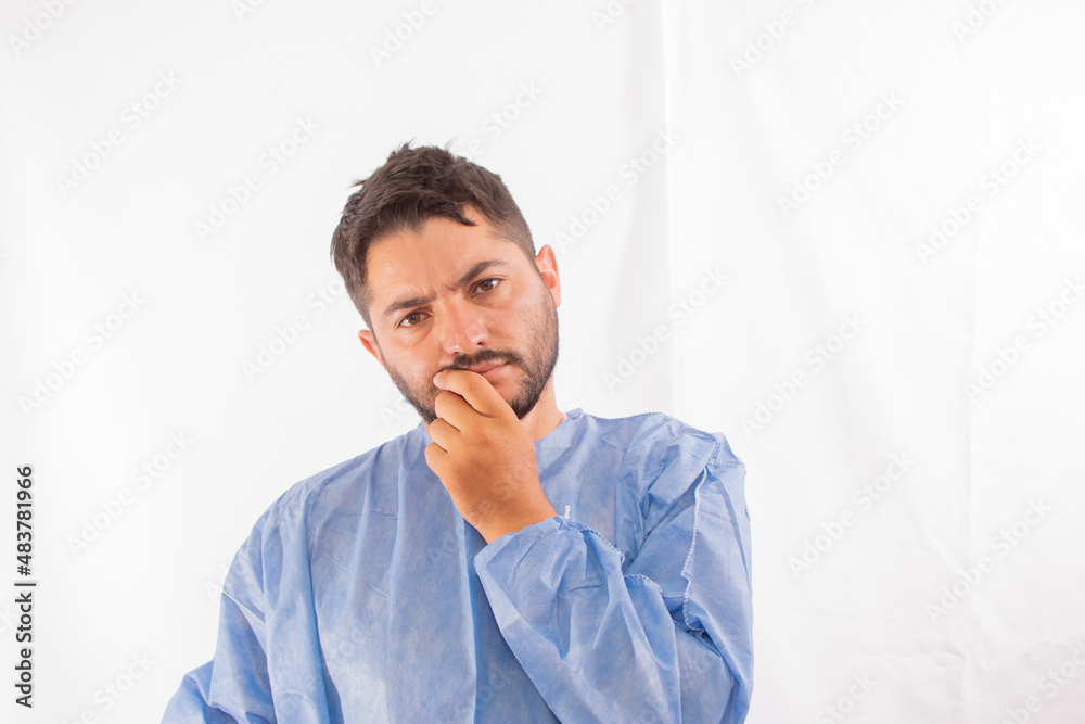 Portrait of tired exhausted nurse or doctor having a coffee break outside in the morning. COVID-19, Coronavirus pandemic Portrait of tired exhausted nurse or doctor having a coffee break outside in the morning. COVID-19, Coronavirus pandemic