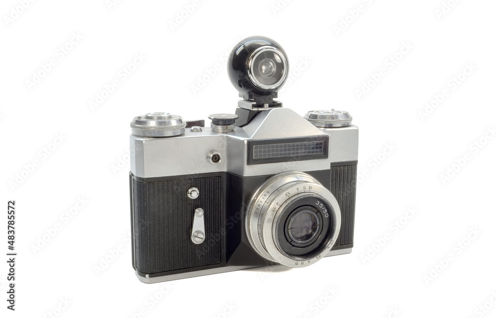 Old film camera with external viewfinder isolated on white background.