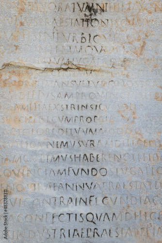 Ancient Greek inscriptions on stone in Ephesus archeological site in Turkey - writings, design, background, texture, creative use