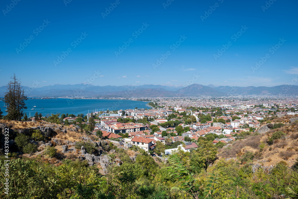 Fethiye landscape and cityscape, aerial view of the popular resort city of Fethiye and the Bay of the Mediterranean sea, Turkey.