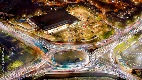Looking down at the light trails on a roundabout in Colchester, Essex, UK photo