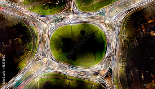 Looking down at the light trails on a roundabout in Colchester, Essex, UK