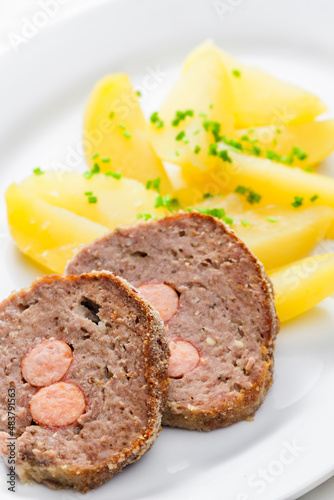 homemade meat loaf filled with sausage