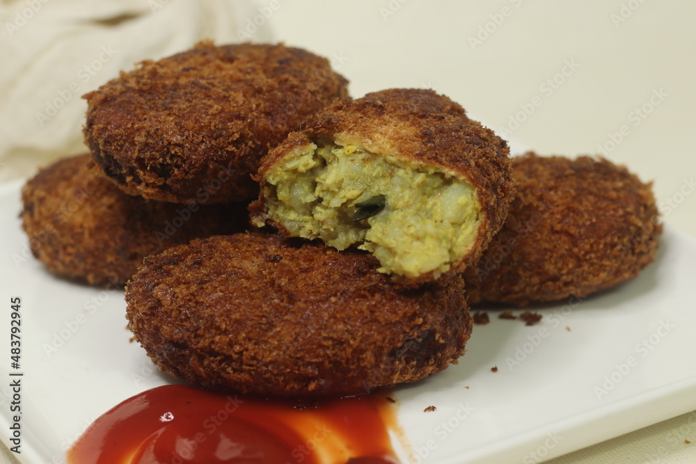 Deep fried Chicken Cutlets. A flat croquette of minced meat covered in bread crumbs and fried Deep fried Chicken Cutlets. A flat croquette of minced meat covered in bread crumbs and fried