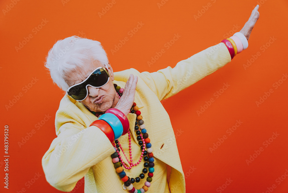 © oneinchpunch - Funny grandmother portraits. Senior old woman dressing elegant for a special event. granny fashion model on colored backgrounds