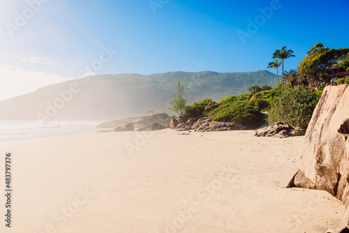Matadeiro beach with morning fog, rocks and ocean in sunny day. Holiday banner in Brazil © artifirsov