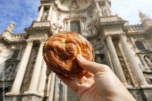 Pastel de carne murciano (Murcian meatloaf) with Cathedral of Murcia, Spain photo