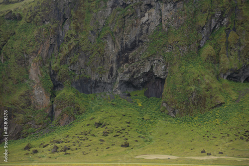 Green Grassy mountain Landscape in the highlands. Travel and nature on a beautiful cold day